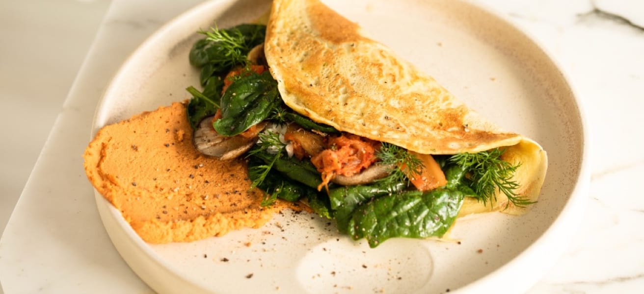 Image of a freshly made omelette served on a plate